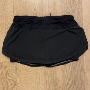 lululemon black running skirt with spandex shorts underneath. Size 4.